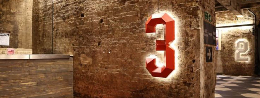 creative signage in an office. Number 3 led sign
