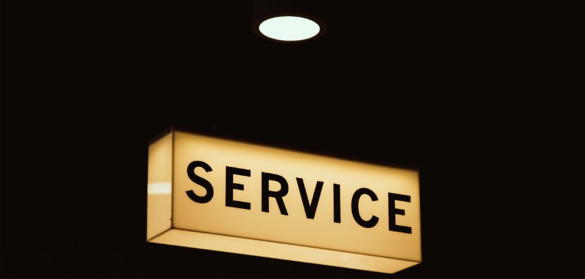 illuminated service sign to promote customer needs